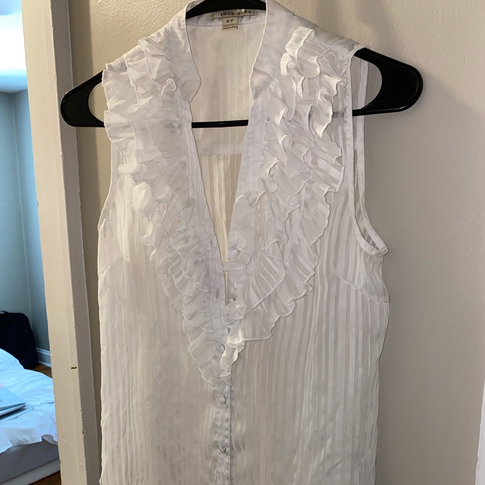 White ruffled blouse